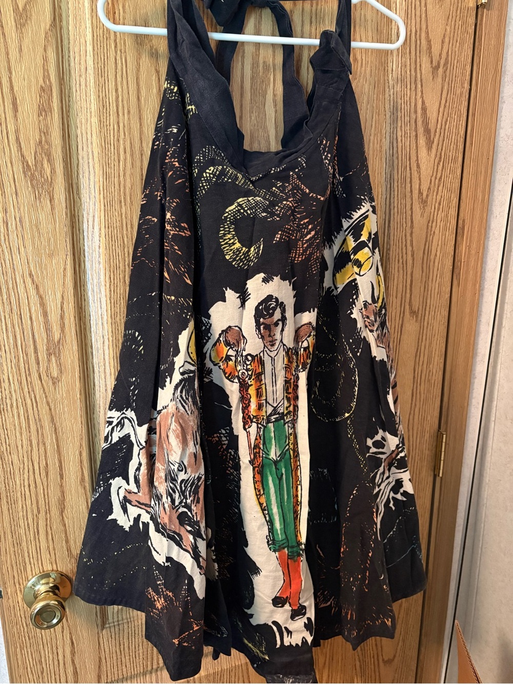 Skirt - ties on the sides. Features Matador and bulls - very pretty!